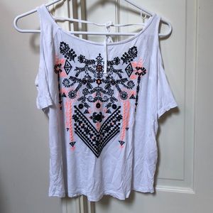 Shoulder revealing tribal patterned top